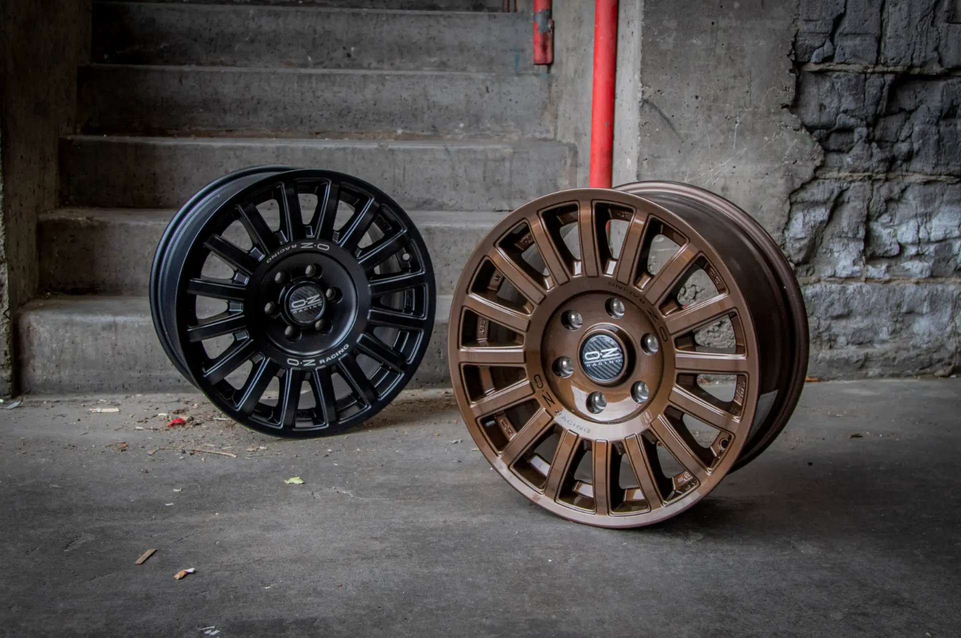 Black and bronze OZ Racing aftermarket wheels photographed for automotive campaigns